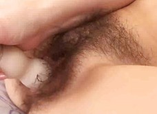 Jasmine moans at her hairy pussy insertion